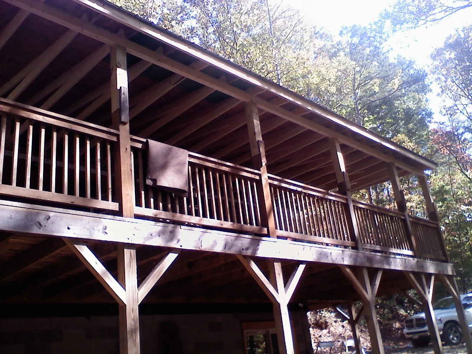 Timber framing under a new elevated porch and deck — Roof Leak Repair in Loami by Roofing Brothers